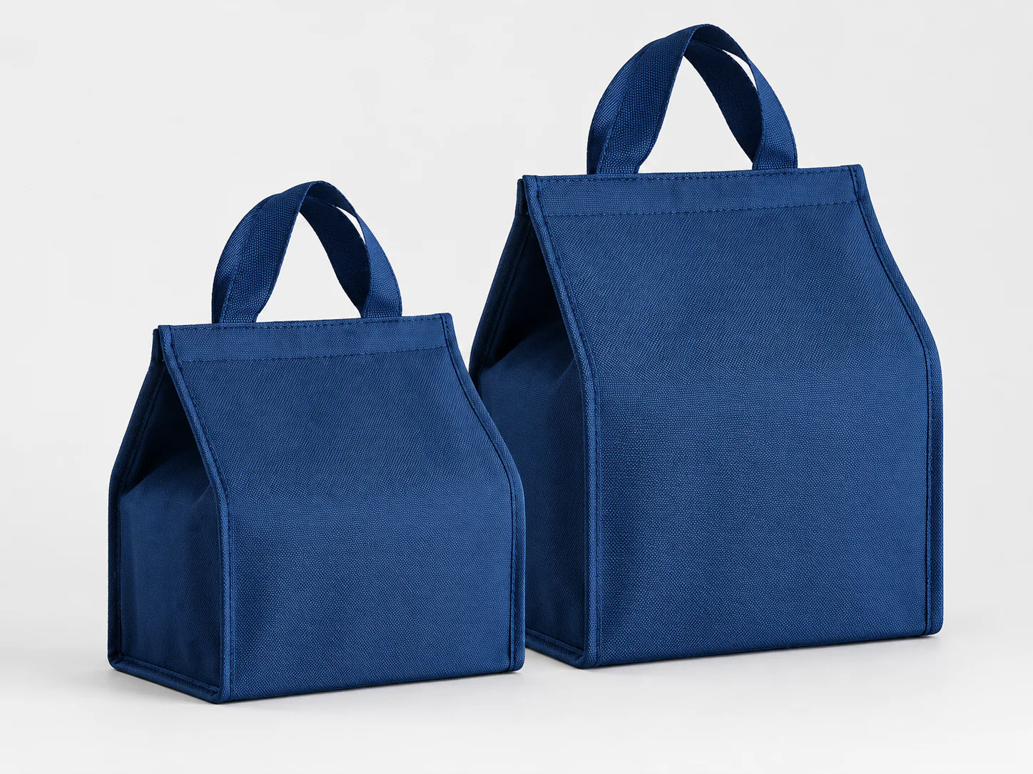Oxford insulated tote in navy — small and large sizes side by side